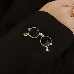 Unique vintage metal glasses shaped pins that add a touch of punk style to your outfit. These mini sunglasses brooches are perfect for both women and men, making them versatile accessories for any party or special occasion. Elevate your clothing game with these trendy and eye-catching pieces.