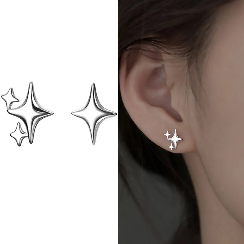 Elegant and minimalist stud earrings designed for women, featuring star and moon motifs with sparkling zircon stones. Crafted from high-quality 925 silver, these earrings are perfect for tragus and cartilage piercings, adding a touch of asymmetrical charm to your fine jewelry collection.