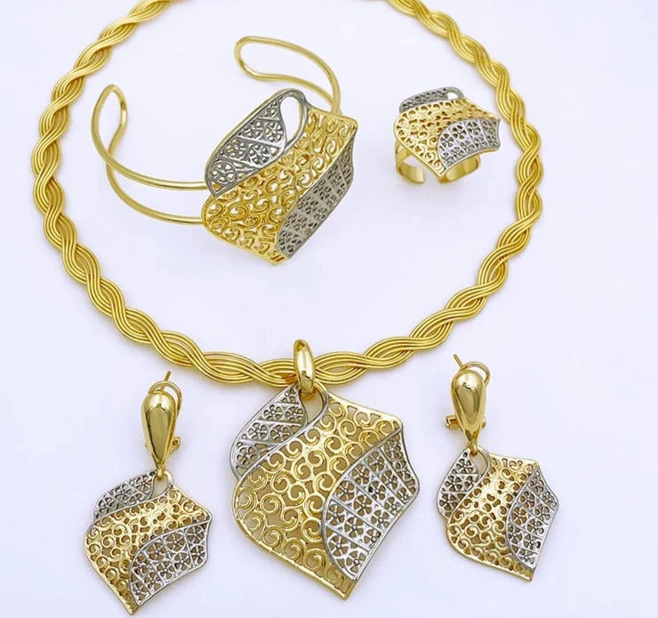  This complete jewelry set for women includes an elegant Italian design with 18K gold plating. The set consists of a necklace, earrings, bracelet, and pendant, making it perfect for parties and special occasions.