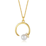 This elegant and luxurious necklace is made of S925 sterling silver and features a beautiful pearl pendant. The minimalist design of the claw bone chain adds a touch of sophistication to this commemorative jewelry gift, perfect for any occasion.