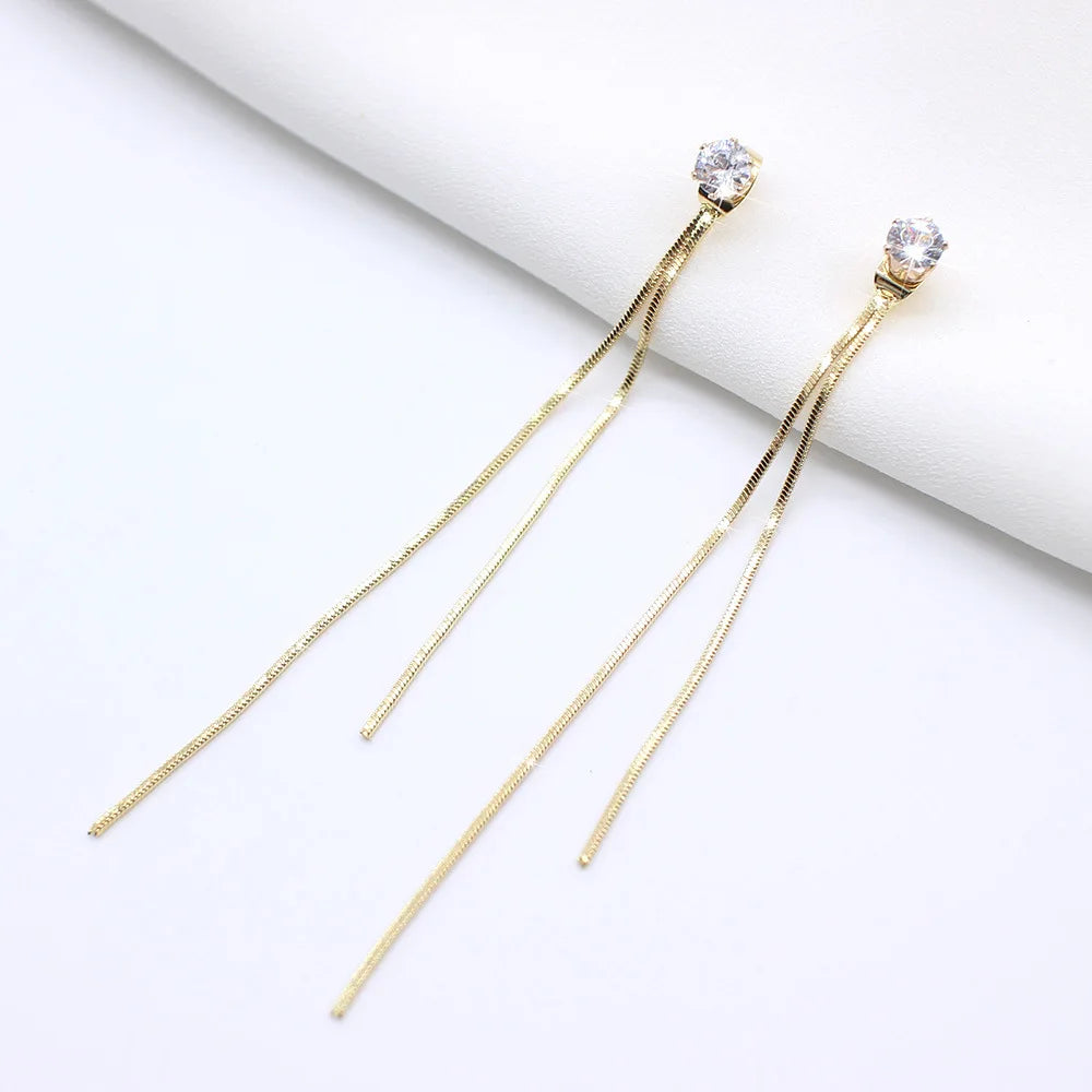 The latest fashion with these elegant Long Wire Tassel Thread Chain Earrings featuring Star and Heart Beads Pendants. Elevate your style with these women's Straight Hanging Earrings that are sure to make a statement in any outfit.