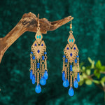 These Bohema Ethnic Fringed Tassel Earrings boast a stylish geometric shape and are crafted with a glossy acrylic water drop. Women of all ages will love wearing these beautiful metal earrings.