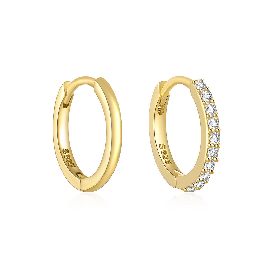 These small huggie earrings are made of 925 sterling silver with a glossy gold color finish, perfect for cartilage piercings. The fine jewelry accessories are designed to add a touch of elegance to any outfit.
