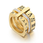 Elegant and stylish fashion jewelry with our collection of stainless steel rings for women. These rings feature black rhinestones and engraved Roman numerals, adding a touch of sophistication to any outfit. With three layers and a square design, these wedding bands are the perfect choice for those seeking a unique and fashionable accessory.