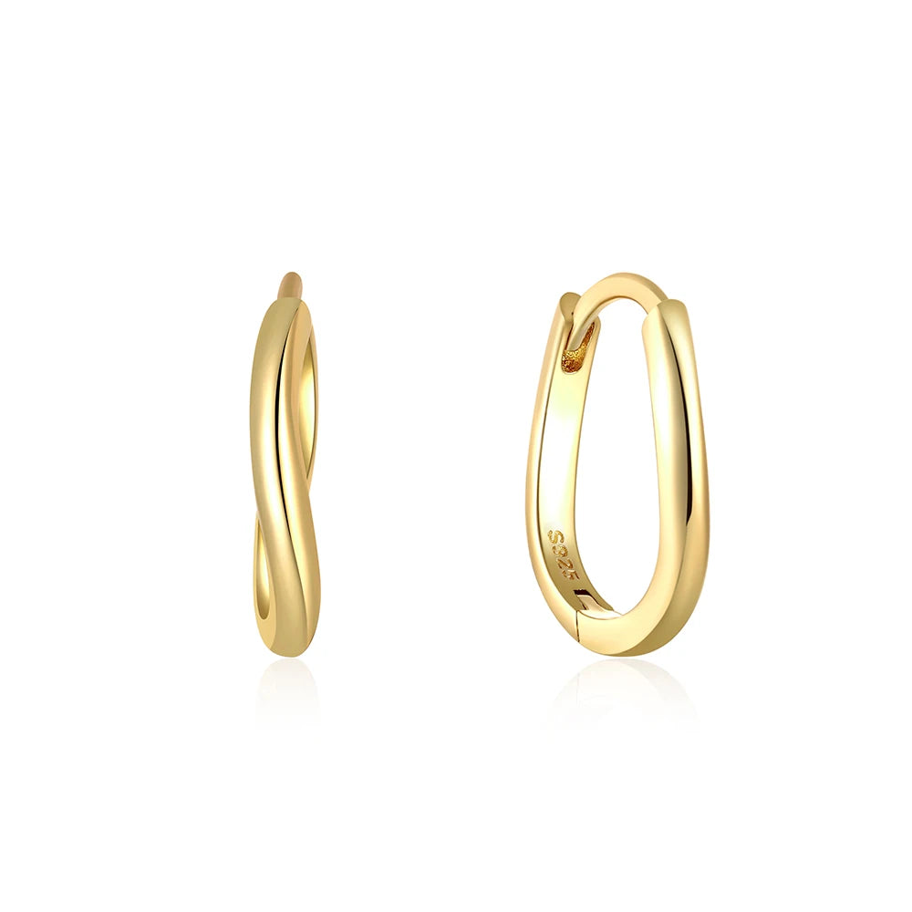 These small huggie earrings are made of 925 sterling silver with a glossy gold color finish, perfect for cartilage piercings. The fine jewelry accessories are designed to add a touch of elegance to any outfit.