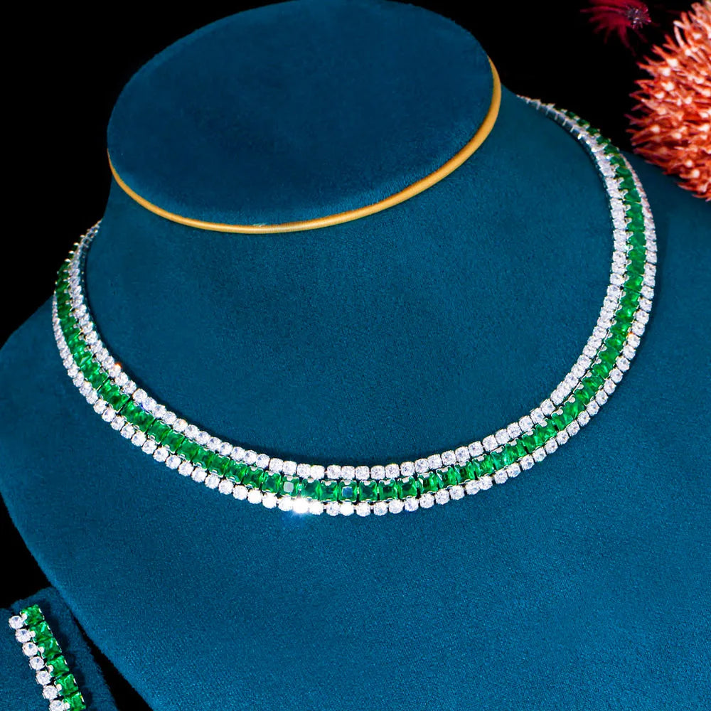 J187 presents a stunning jewelry set for Nigerian women, perfect for bridal weddings. This set features an elegant, shiny green and white baguette CZ silver color necklace and earrings. With its unique design and high-quality craftsmanship, this jewelry set is sure to make a statement on any special occasion.