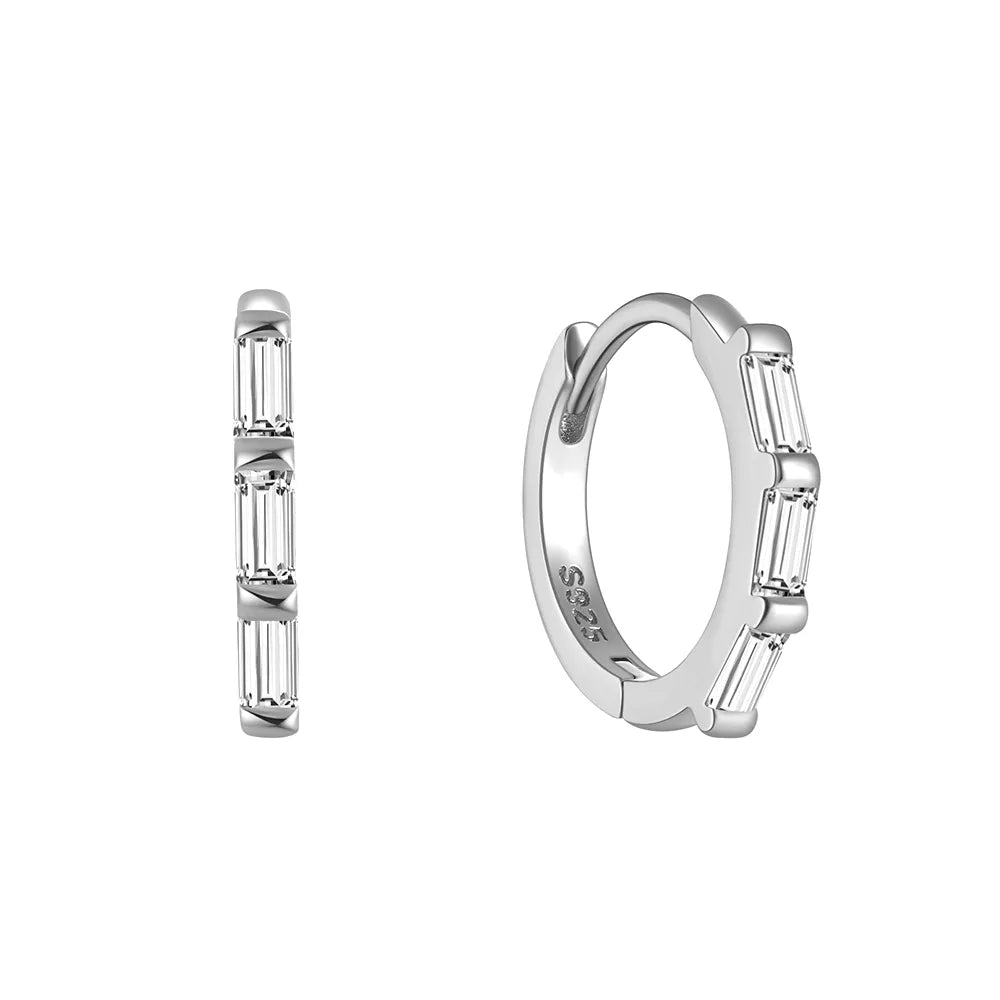 These small huggie earrings are made of 925 sterling silver with a glossy gold color finish, perfect for cartilage piercings. The fine jewelry accessories are designed to add a touch of elegance to any outfit.