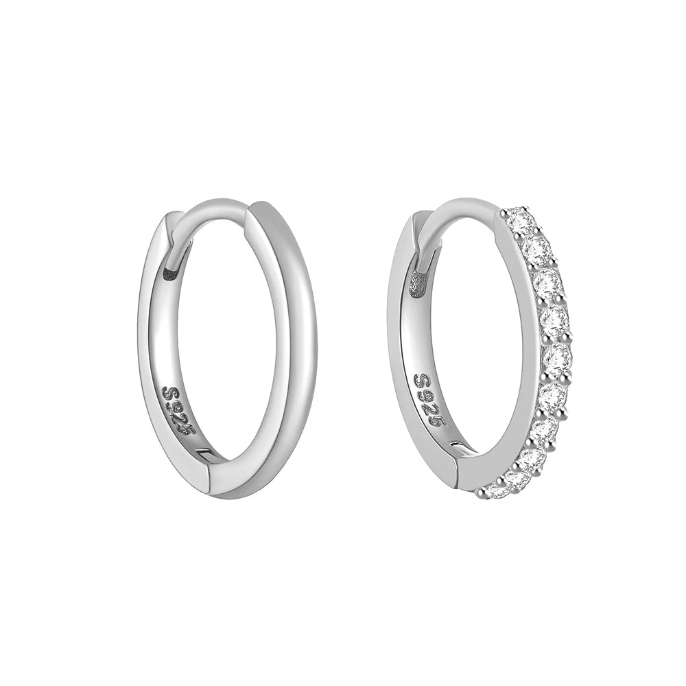 These small huggie earrings are made of 925 sterling silver with a glossy gold color finish, perfect for cartilage piercings. The fine jewelry accessories are designed to add a touch of elegance to any outfit.