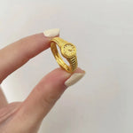 The elegance of the Zircon Mini Watch Ring, a stunning piece of jewelry designed for women. Crafted from gold-colored stainless steel, this adjustable 520 watch ring is perfect for weddings or as a thoughtful gift. Embrace the beauty of this aesthetic jewelry and surprise the special woman in your life with this exquisite femme.