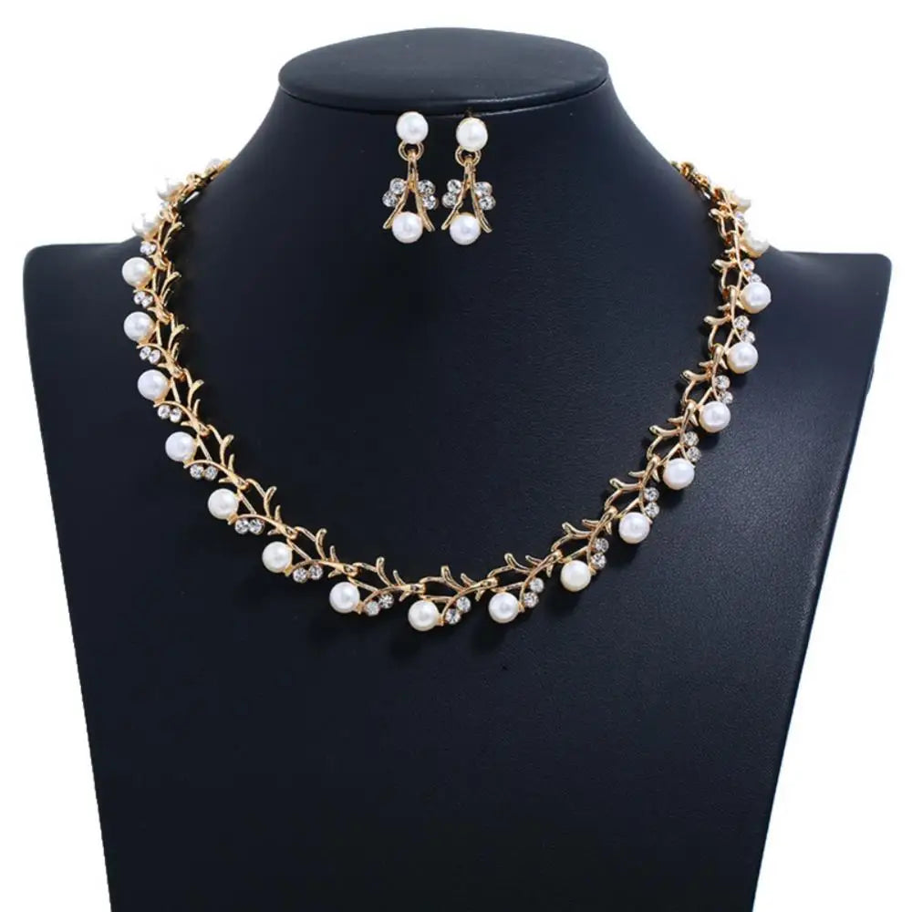 Elegant Bridal Jewelry Set: Rhinestone and Faux Pearl Necklace, Earrings, and Bracelet