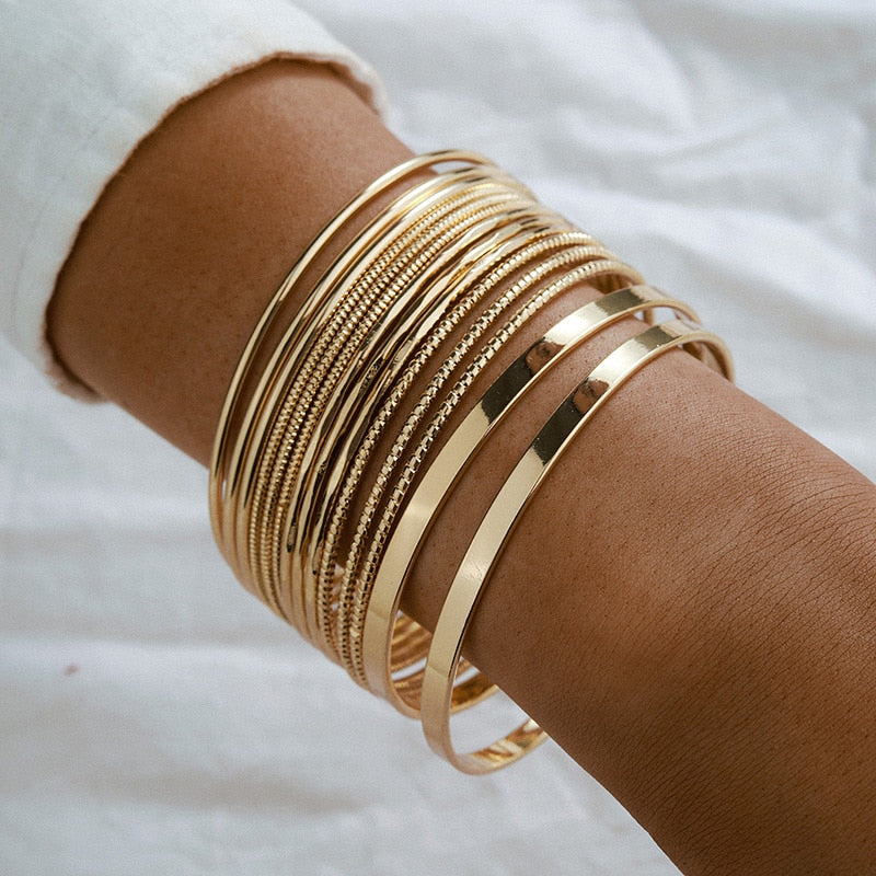 Fit for fashion lovers, these bracelets are crafted from zinc alloy with a luxurious golden hue. They're perfect for any woman's look, and with their universal compatibility, they make for a great addition to any ensemble!
