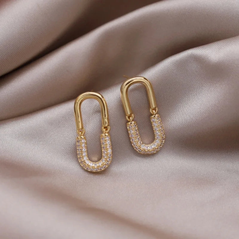 Introducing the elegant women's wedding party accessories, we present the luxurious square zircon pendant earrings in 16K gold plated fashion jewelry from Korea. This new design is sure to add a touch of sophistication to any outfit.