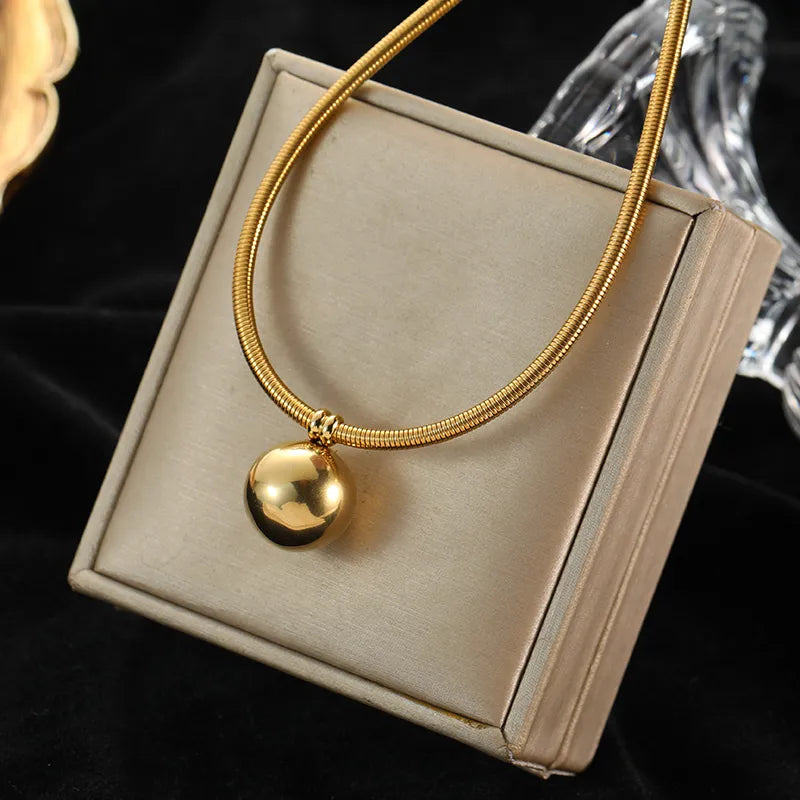 This necklace features hollow ball beads made of 316L stainless steel in a gold color, designed for women as a non-fading choker jewelry piece perfect for gifts or parties.