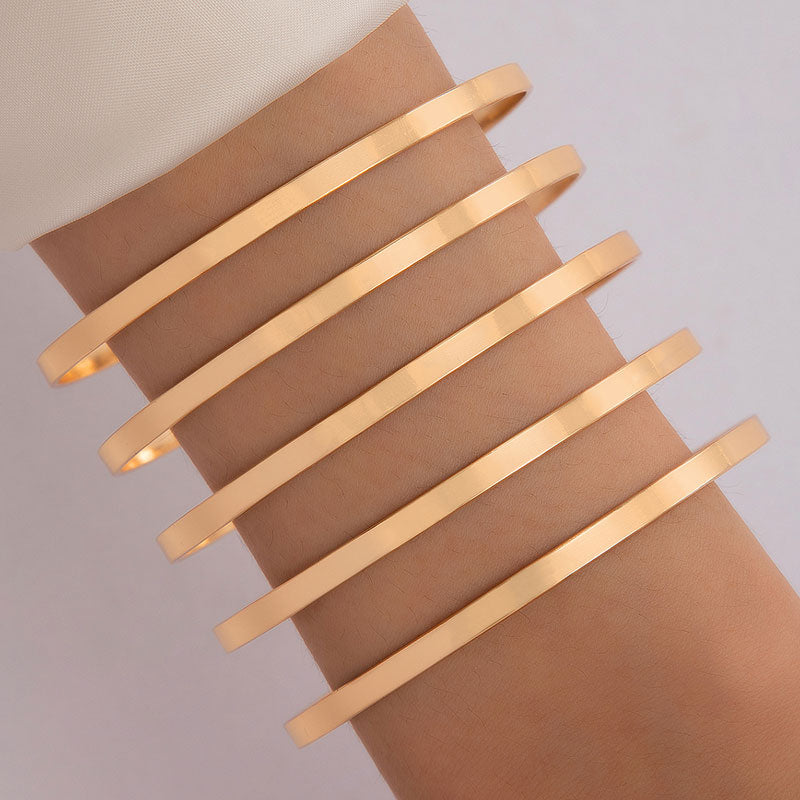 Fit for fashion lovers, these bracelets are crafted from zinc alloy with a luxurious golden hue. They're perfect for any woman's look, and with their universal compatibility, they make for a great addition to any ensemble!