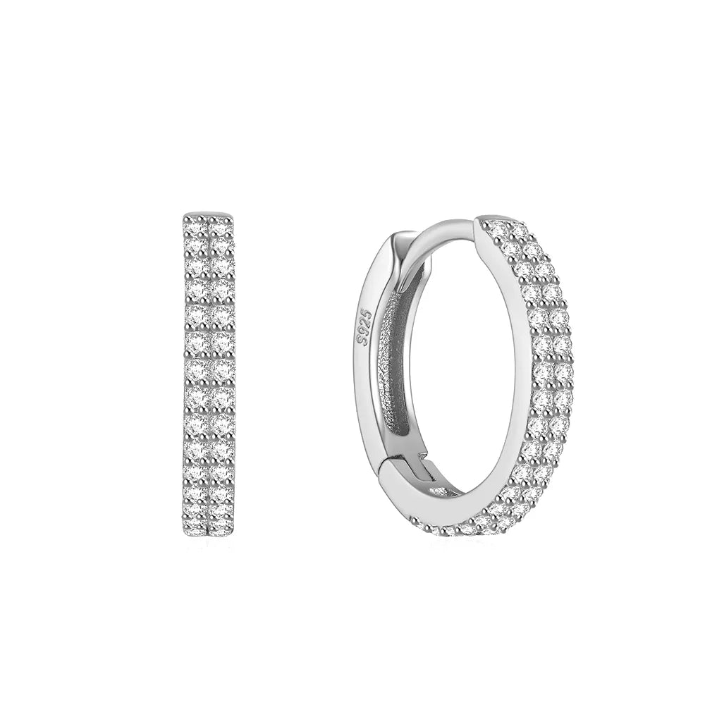 These small huggie earrings are made of 925 sterling silver with a glossy gold color finish, perfect for cartilage piercings. The fine jewelry accessories are designed to add a touch of elegance to any outfit.