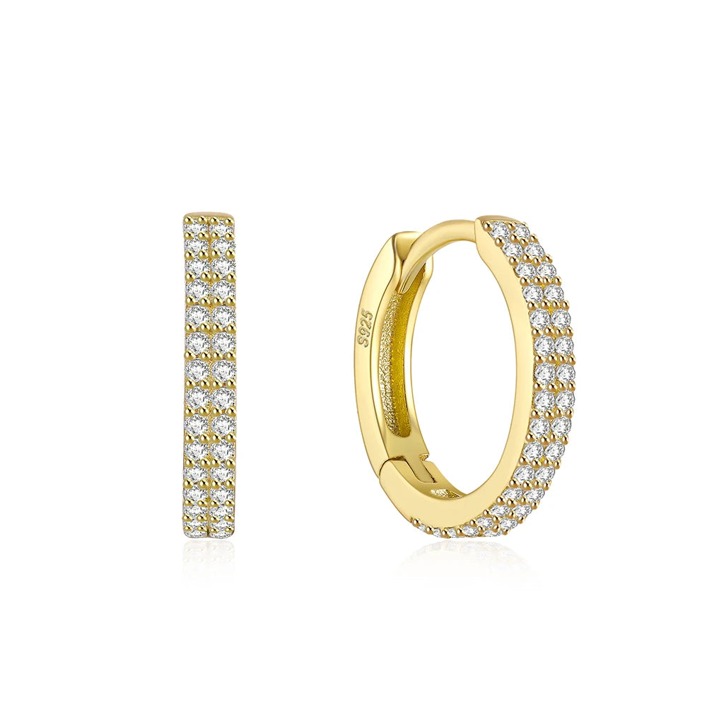 These small huggie earrings are made of 925 sterling silver with a glossy gold color finish, perfect for cartilage piercings. The fine jewelry accessories are designed to add a touch of elegance to any outfit.