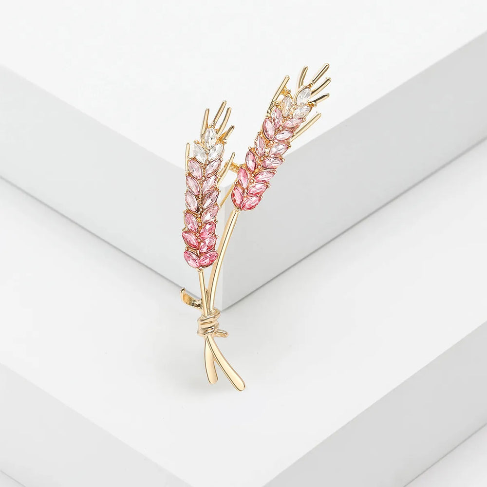 Elevate your style with these exquisite Korean fashion-inspired women's brooches. Crafted with attention to detail, these lapel pins feature a stunning 3-color rhinestone design resembling an ear of wheat. Perfect for adding a touch of luxury to your clothing, these jewelry accessories are a must-have for any fashion enthusiast.