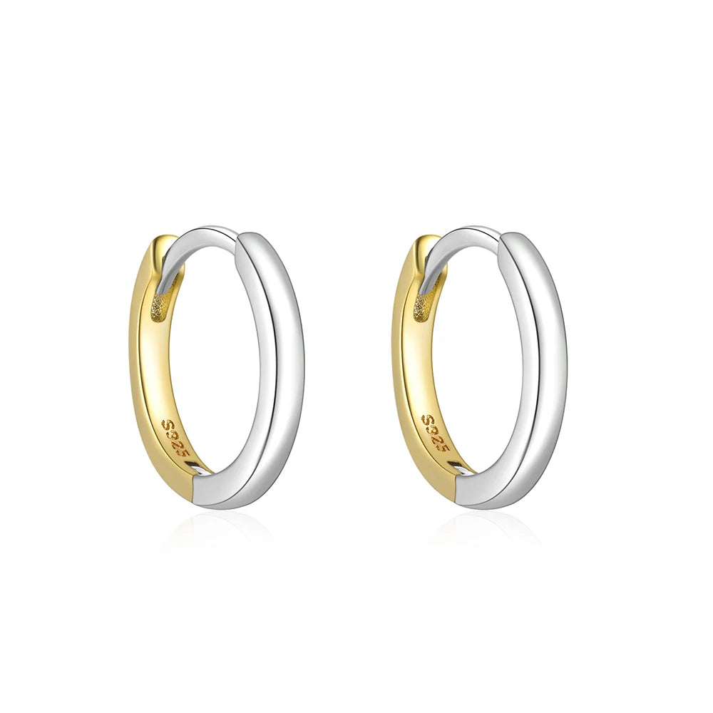 These small huggie earrings are made of 925 sterling silver with a glossy gold color finish, perfect for cartilage piercings. The fine jewelry accessories are designed to add a touch of elegance to any outfit.