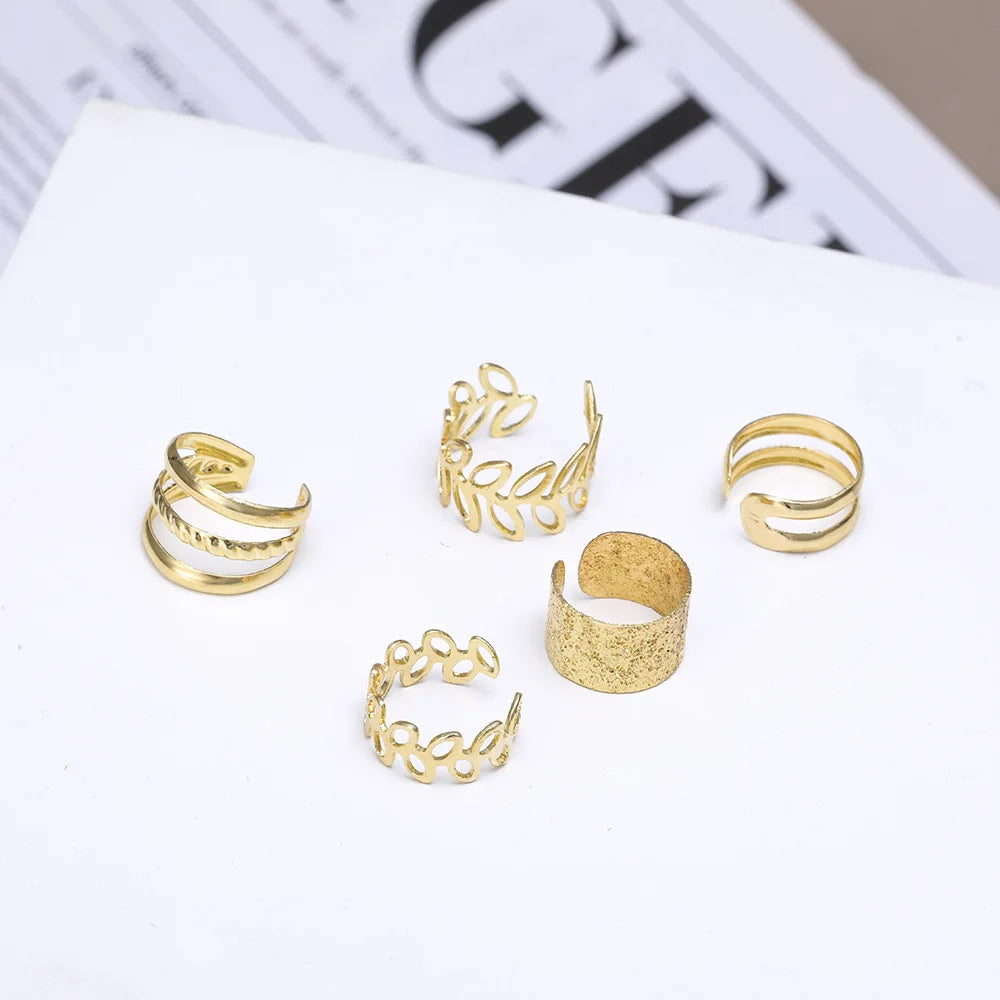 This set includes five pieces of vintage-style gold color leaf ear cuffs that do not require piercing, designed as fake cartilage clip earrings suitable for both women and men who appreciate creative and trendy jewelry pieces.