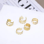 This set includes five pieces of vintage-style gold color leaf ear cuffs that do not require piercing, designed as fake cartilage clip earrings suitable for both women and men who appreciate creative and trendy jewelry pieces.