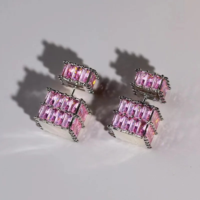 The exquisite earrings adorned with dazzling zircon gemstones, radiating elegance and sophistication. These square golden earrings are a symbol of luxury and make for the perfect Christmas gift for women, adding a touch of cuteness to any outfit.
