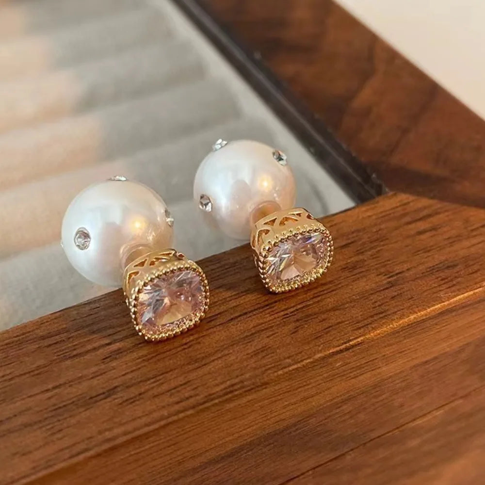 A stunning collection of elegant and luxurious women's jewelry with our fashion pearl earrings. These sweet and classic pearl earrings are adorned with sparkling zircon stones, making them the perfect accessory for any party or banquet. Explore our wholesale options and find the ideal gift for someone special.