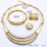 This exquisite jewelry set designed for women features a luxurious 18K gold plating and a unique two-tone design, making it an elegant choice for weddings and parties. The set includes a necklace and earrings, perfect for adding a touch of sophistication to any outfit.