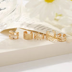 This set includes five pieces of vintage-style gold color leaf ear cuffs that do not require piercing, designed as fake cartilage clip earrings suitable for both women and men who appreciate creative and trendy jewelry pieces.