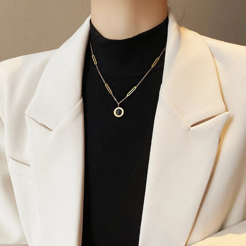 Elevate your style with the timeless elegance of the Roman Digital Wafer Pendant Necklace. Crafted from high-quality stainless steel, this classic fashion accessory is perfect for any occasion. Whether you're attending a Christmas party or simply want to add a touch of sophistication to your everyday look, this necklace is a must-have for fashion-forward women in 2023. Embrace your inner glamour and make a statement with this sexy and chic piece of jewelry