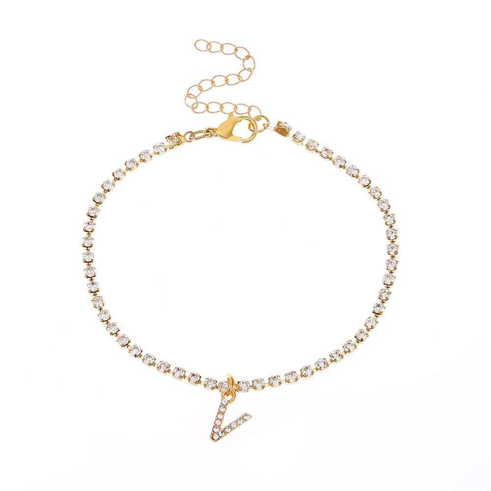 This ankle bracelet features an initial letter design with crystal zircon accents, perfect for women looking for a stylish foot chain to wear at the beach or as boho jewelry.