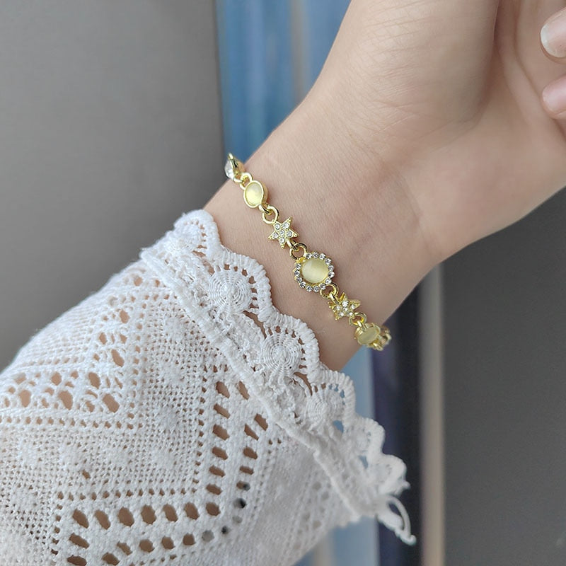 This beautiful metal bracelet is the perfect accessory to any look. Show off your unique style with this one-of-a-kind piece of jewelry that is sure to turn heads.