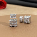 The exquisite earrings adorned with dazzling zircon gemstones, radiating elegance and sophistication. These square golden earrings are a symbol of luxury and make for the perfect Christmas gift for women, adding a touch of cuteness to any outfit.