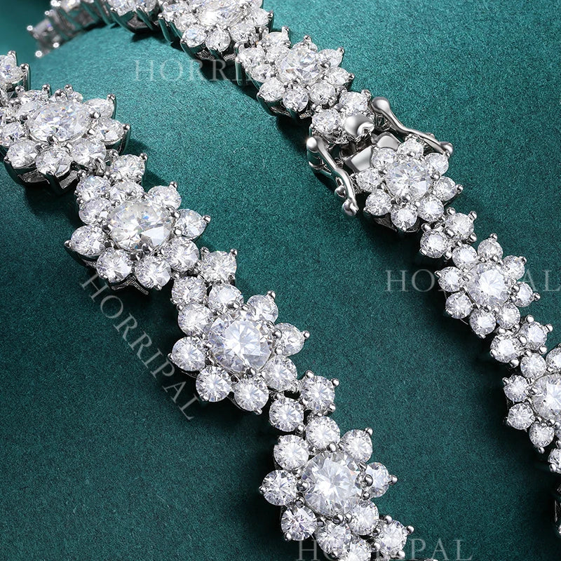 This elegant sunflower wedding chain for women is a luxurious and exquisite piece of jewelry. Made with a 34.96-38.96CT DVVS1 full moissanite necklace, it exudes a sense of opulence and sophistication. Crafted with S925 silver, this necklace is of high quality and perfect for any special occasion. Available at wholesale prices, it is a great option for those looking for a stunning and affordable piece of jewelry.