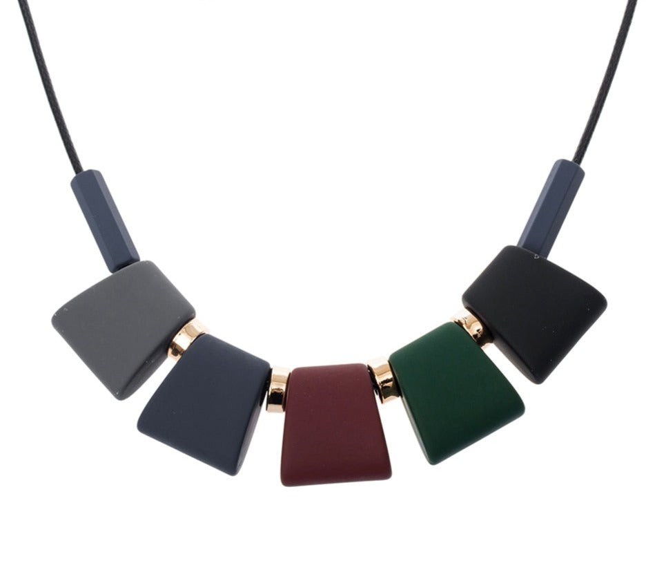 Charm your neck with these stunning geometric wooden blocks necklaces &amp; pendants! Crafted from Metal, they make a unique fashion statement. Experience the rope chain’s captivating look to ignite your ensemble!