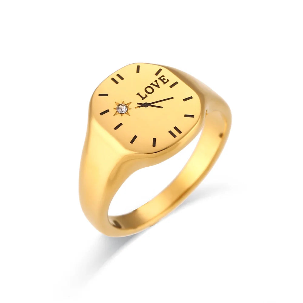 This trendy 18K gold-plated ring for women is a romantic clock LOVE ring made of stainless steel. It is a waterproof jewelry gift that exudes French charm.