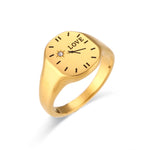 This trendy 18K gold-plated ring for women is a romantic clock LOVE ring made of stainless steel. It is a waterproof jewelry gift that exudes French charm.
