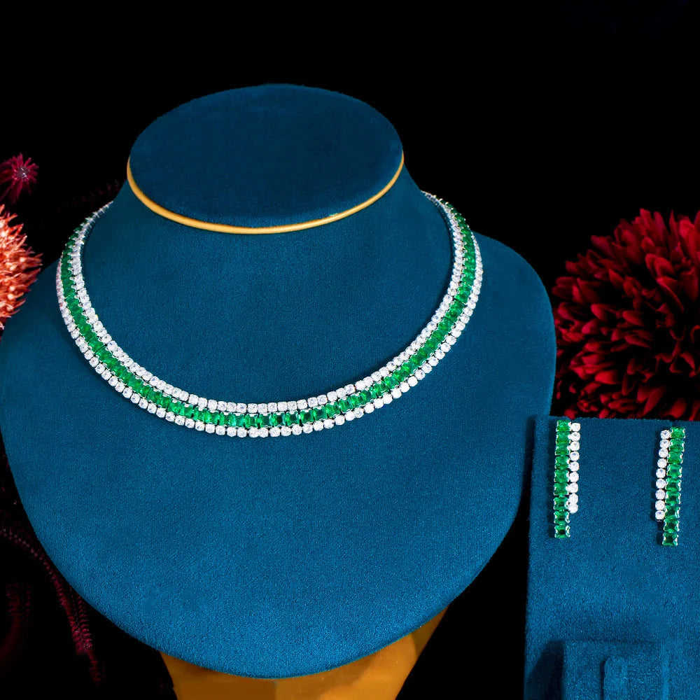 J187 presents a stunning jewelry set for Nigerian women, perfect for bridal weddings. This set features an elegant, shiny green and white baguette CZ silver color necklace and earrings. With its unique design and high-quality craftsmanship, this jewelry set is sure to make a statement on any special occasion.