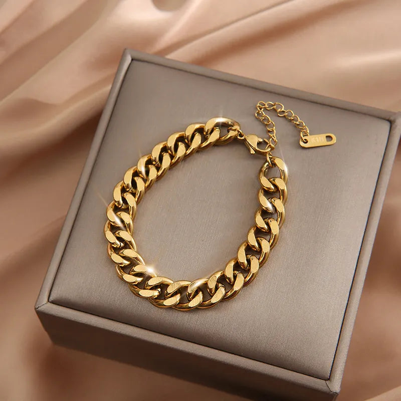  A stylish and elegant choice, this fashion link chain bangle bracelet is crafted from 316L stainless steel. The bracelet showcases a beautiful gold color, adding a touch of sophistication to any outfit. It makes for a thoughtful gift for girls who appreciate fine jewelry.