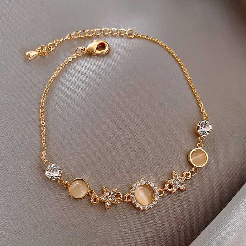 This beautiful metal bracelet is the perfect accessory to any look. Show off your unique style with this one-of-a-kind piece of jewelry that is sure to turn heads.