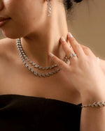 Elevate your wedding ensemble with our stunning zirconia jewelry set, featuring a necklace and earrings. This elegant bridal jewelry set is designed for women who appreciate timeless beauty and comes with free shipping.