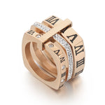 Elegant and stylish fashion jewelry with our collection of stainless steel rings for women. These rings feature black rhinestones and engraved Roman numerals, adding a touch of sophistication to any outfit. With three layers and a square design, these wedding bands are the perfect choice for those seeking a unique and fashionable accessory.